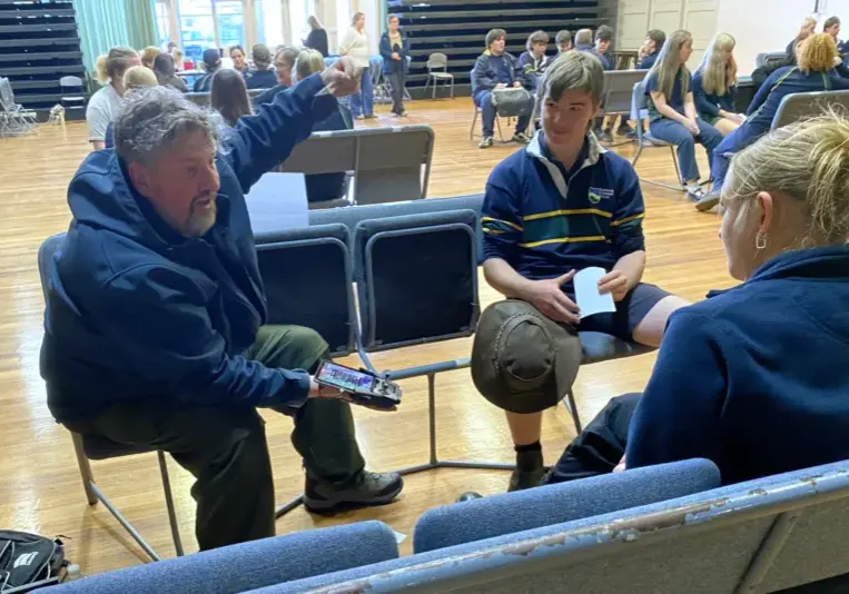 Mick Green talking with leongatha secondary students mesley hall leongatha