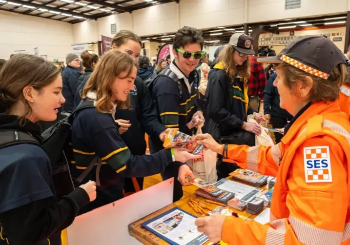 Students at careers expo with ses worker